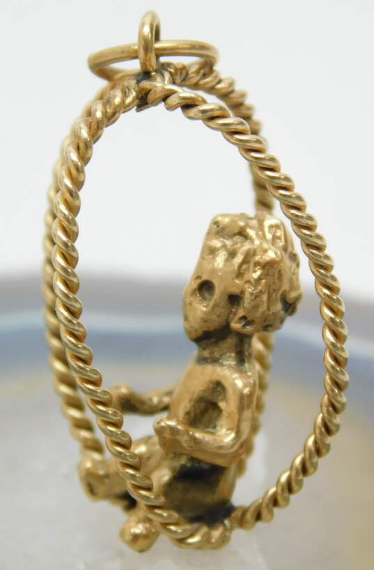 14K Gold Unique Child Baby Figural Rope Wire Swing Pendant 5.8g image number 3