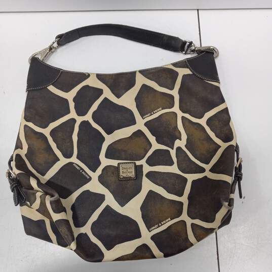 Dooney and Bourke Women's Animal Print Leather Purse image number 1