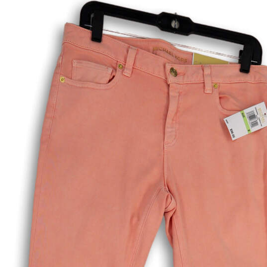 NWT Womens Pink Denim Mid-Rise Light Wash Pockets Skinny Leg Jeans Size 8 image number 4