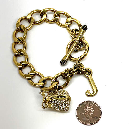Designer Juicy Couture Gold-Tone Rhinestone Toggle Heart Charm Bracelet image number 2
