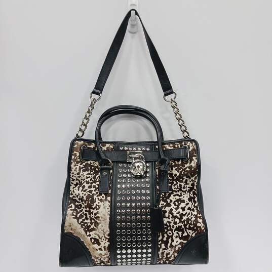 Michael Kors Animal Print Brown Studded Leather Handbag image number 1