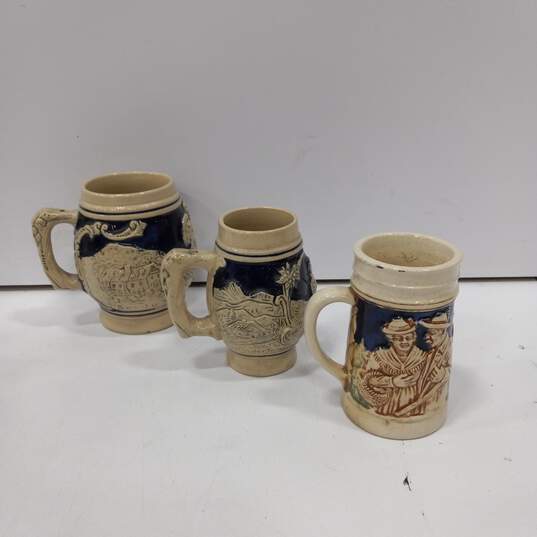 Lot of 11 Assorted Sizes German Beer Steins & Mugs image number 7