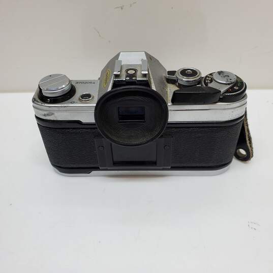 UNTESTED Sliver/Black Canon AE-1 Film Camera Bundle with 3 lenses, Flash & Bag image number 3