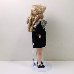 Antique Porcelain Doll In Black Dress alternative image