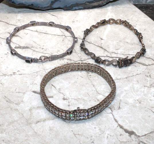 Bundle of 3 Sterling Silver Tennis Bracelets - 49.3g image number 4