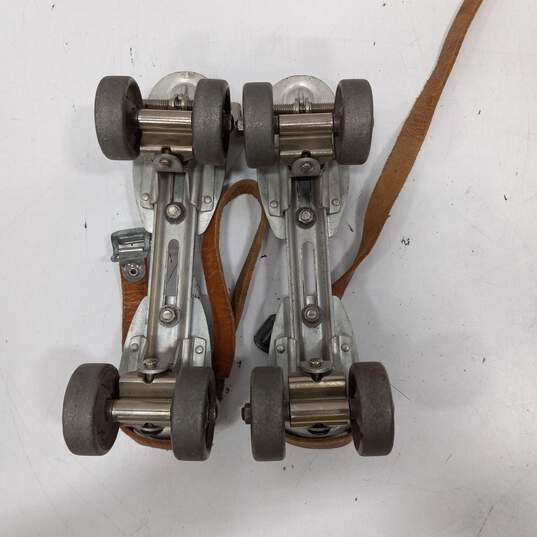 Pair of Vintage Metal Silver Tone Roller Skates Size Adjustable image number 4