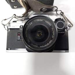 Olympus OM10 Slr Vintage Film Camera 35mm W/ Zuiko Auto-T 135 Manual AD alternative image