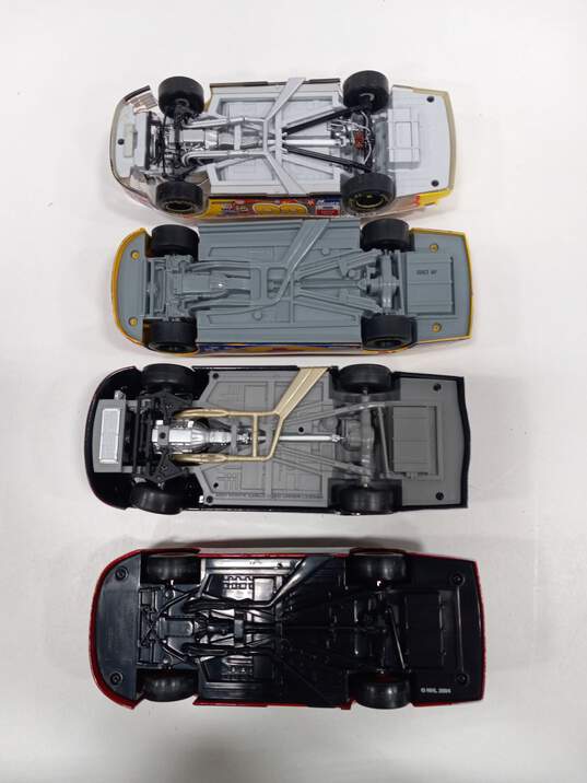 Bundle of 4 Assorted Racing Champions Toy Cars image number 6