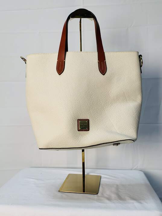 White Dooney & Bourke Handbag Certified Authentic image number 1