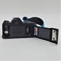 Canon T50 50mm SLR Film Camera w/ Gemini Auto 2x Tele Converter Lens, Bag, Manuals and Flash image number 7