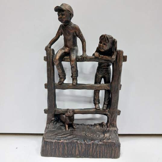 Montana Lifestyles Sculpture of Children on a Fence image number 1