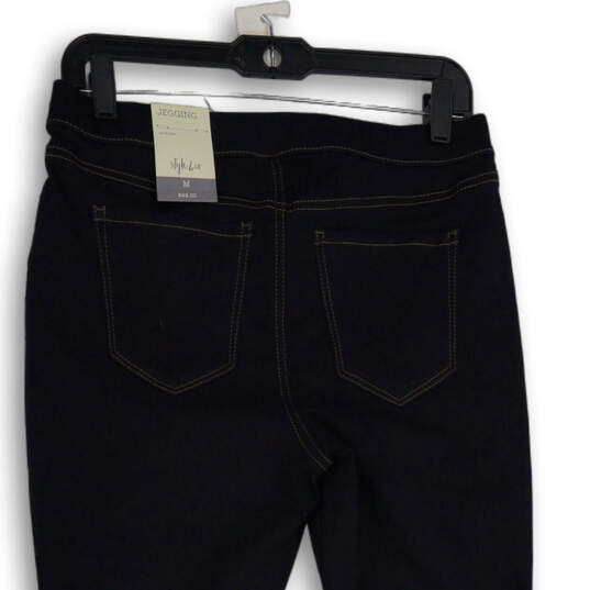 NWT Womens Blue Denim Dark Wash Mid-Rise Skinny Leg Jegging Jeans Size M image number 4