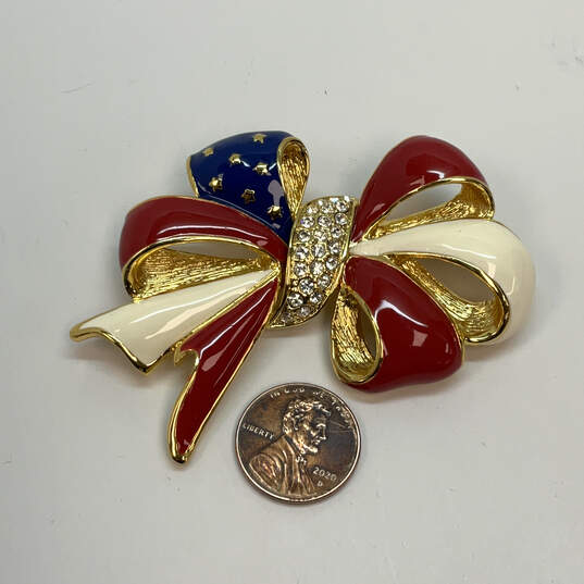 Designer Joan Rivers Gold-Tone Crystal Stone Enamel Flag Ribbon Brooch Pin image number 2