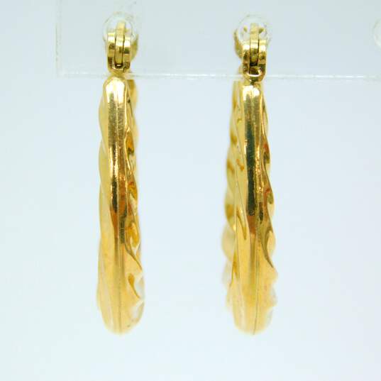 14K Yellow Gold Swirl Oblong Hoop Earrings 1.6g image number 3