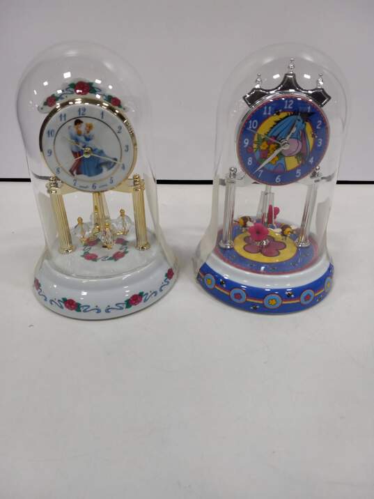Set of 2 Disney Cinderella/Prince Charming & Eeyore Anniversary Dome Clocks image number 1
