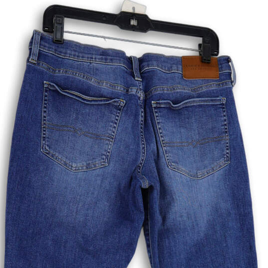 Womens Blue Denim Medium Wash Distressed Straight Leg Jeans Size 12/31 image number 4