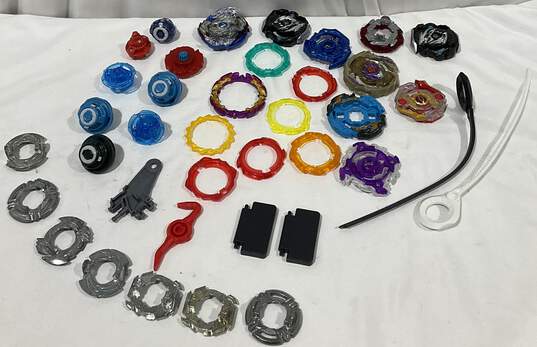 Lot Of Beyblade Parts & Pieces image number 3