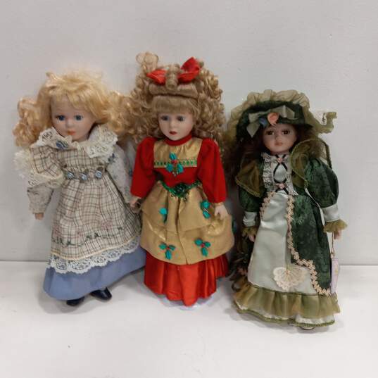 Bundle of 3 Porcelain Dolls image number 1