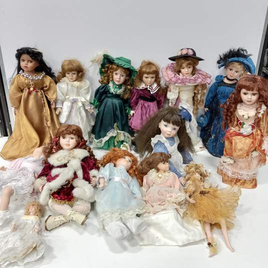 Bundle of 14 Assorted Porcelain Dolls w/Accessories image number 1