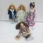 Bundle of Four Porcelain Dolls image number 1