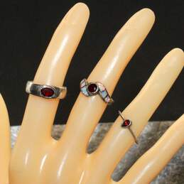 Sterling Silver Ring Set with Garnets and Opal