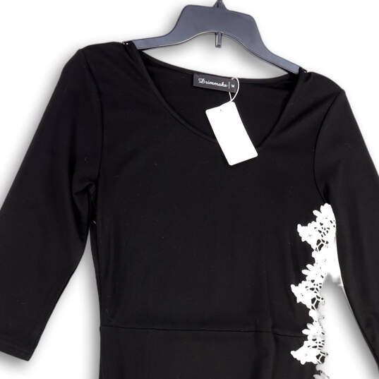 NWT Womens Black Lace Asymmetric Hem 3/4 Sleeve Bodycon Dress Size Medium image number 3