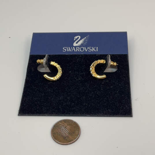 Designer Swarovski Gold-Tone Engraved Classic Mini Hoop Earrings image number 4