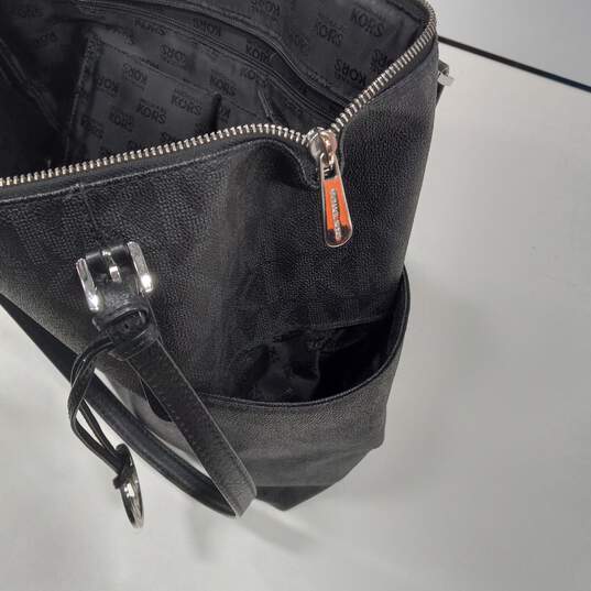 michael kors black monogram backpack