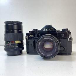 Canon A-1 35mm SLR Camera with 50mm & 135mm Lens