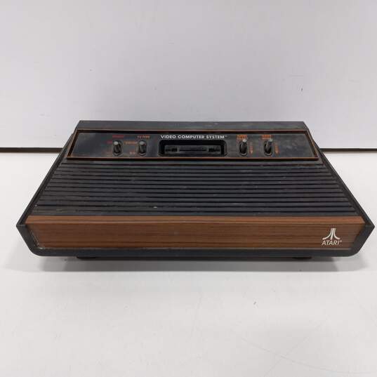 Atari 2600 Console w/ 7 Assorted Games image number 2