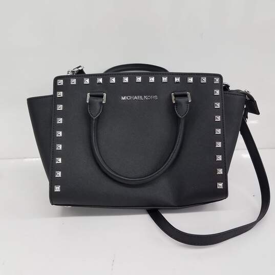 Buy the Michael Kors Studded Black Crossbody Bag | GoodwillFinds