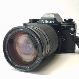 Nikon EM 35mm SLR Camera with 28-210mm Camera Lens