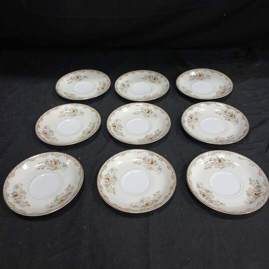 Bundle of 9 White Imperial Fine China Saucers w/ Floral Pattern image number 1