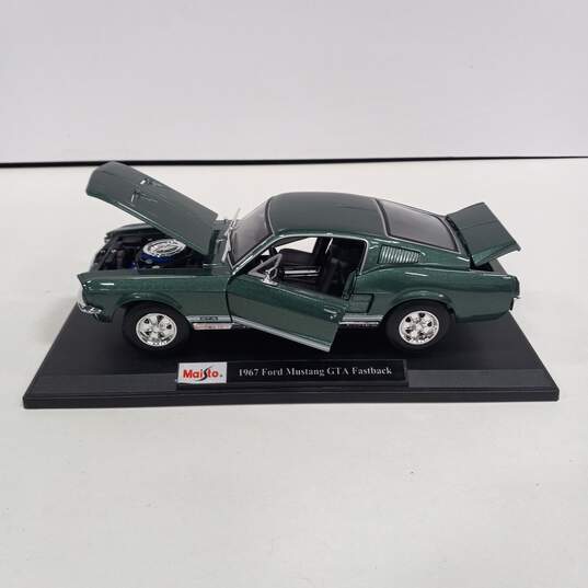 Maisto 1967 Ford Mustang GTA Fastback Model Car W/ Display image number 2
