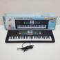 Multifunction Electronic Keyboard W/Microphone Untested image number 1