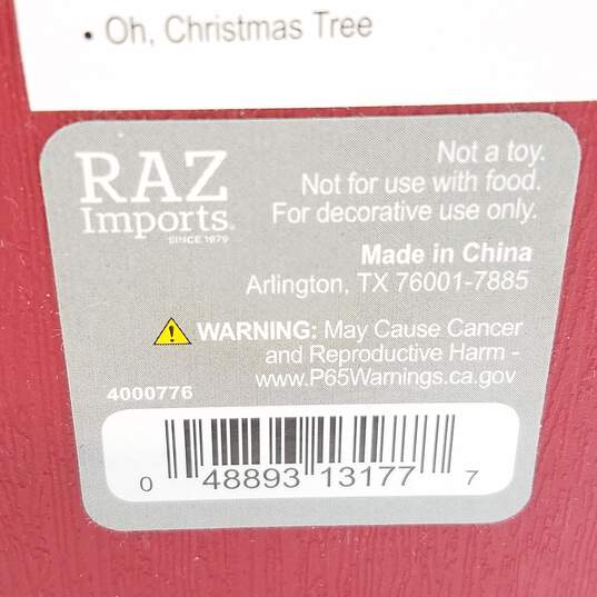 Raz Imports Santa Decorating Tree Light Up TV Snow Globe image number 9