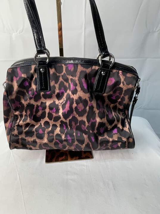 Certified Authentic Coach Cheetah Print w/Purple Accents Hand Bag w/Crossbody Strap image number 2