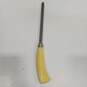 PAIR OF YELLOW BAKELITE HANDLED HONING ROD AND CARVING KNIFE image number 4