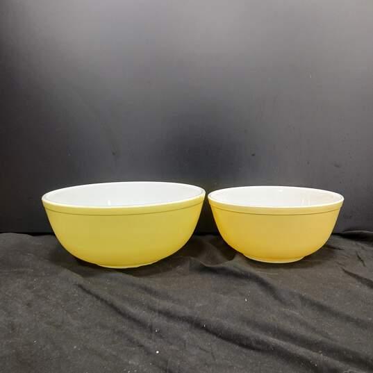 Two Vintage Pyrex Yellow Mixing Bowls image number 1