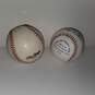 Pair of Signed Baseballs by Players #45 and 52 image number 3