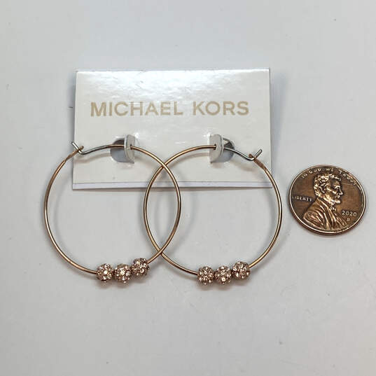 Designer Michael Kors Gold-Tone Clear Crystal Balls Hoop Earrings image number 3