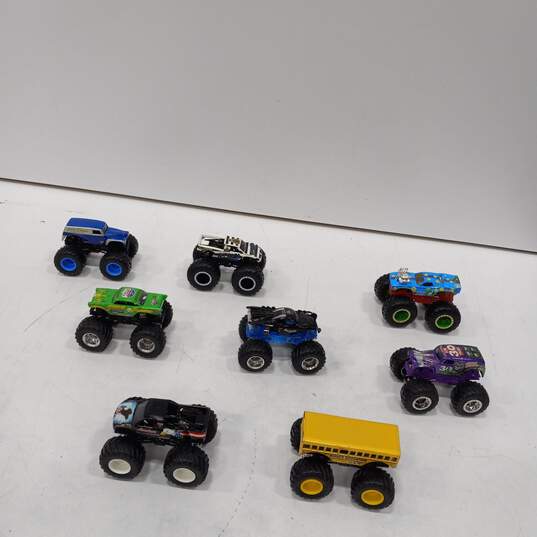 Bundle of Assorted Monster Jam Toy Cars with Travel Case image number 3