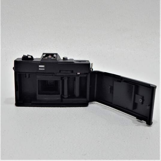 Panasonic PalmSight PV-L557 VHS-C Handheld Video Camera W/ Manuals & Accessories & Ninoka NK-700 W/ 50mm Lens image number 8