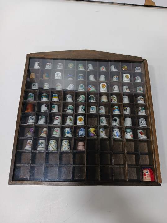 Mixed Lot of 75 Porcelain Souvenir Thimbles in Wooden Shadow Box Display image number 1