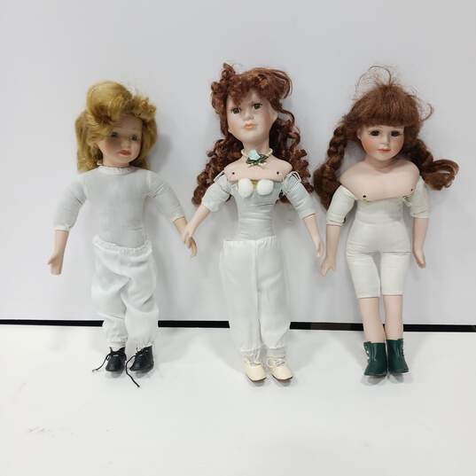 Bundle of 3 Assorted Porcelain Dolls image number 1