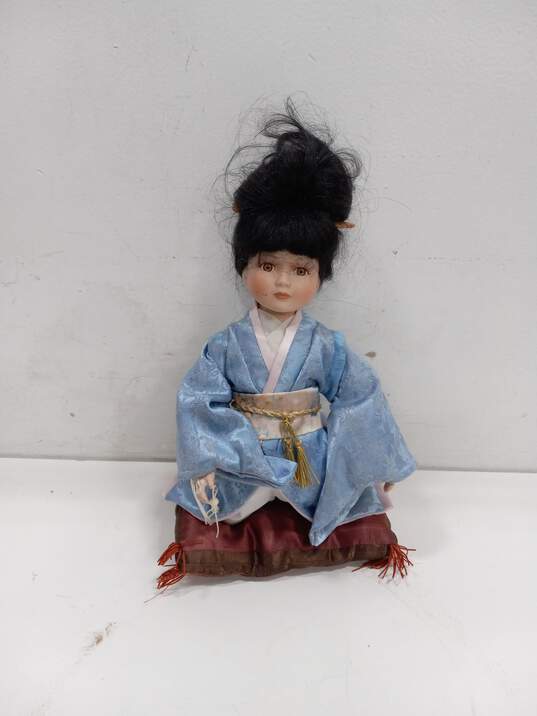 Bundle of 3 Assorted American & Japanese Themed Porcelain Dolls w/ Two Stands image number 3