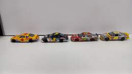 Bundle of 4 Assorted Racing Champions Toy Cars alternative image