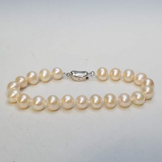 Sterling Silver FW Pearl Knotted 7.8mm 7in Bracelet 17.0g image number 1