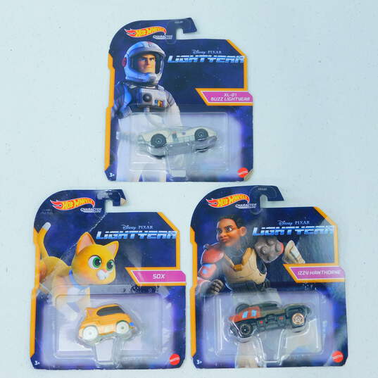 3 Mattel Hot Wheels/Buzz Lightyear Carts Sox Buzz & Izzy Hawthorne Carded image number 1