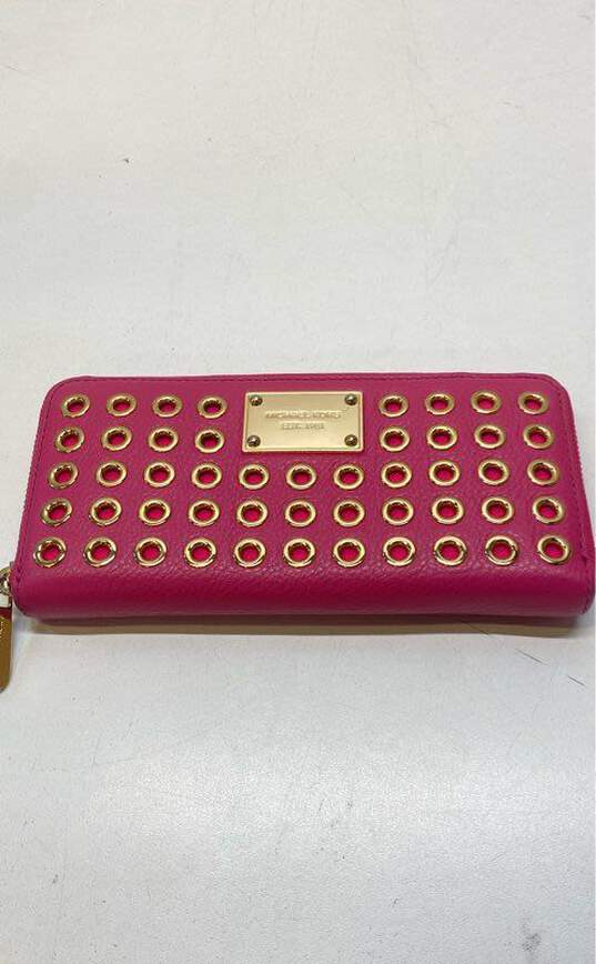 Michael Kors Leather Eyelet Embellished Wallet Pink image number 1